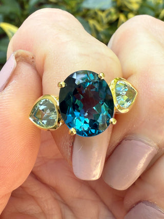 Oval Blue Topaz and Pear Shaped Aquamarine Triad Ring